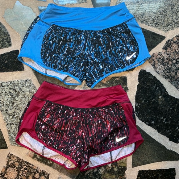 Nike Pants - Nike Women's Screen Fuzz Printed Dry Crew Running Shorts 
Red and Blue pair. XS